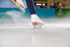 Person ice skating on the rink