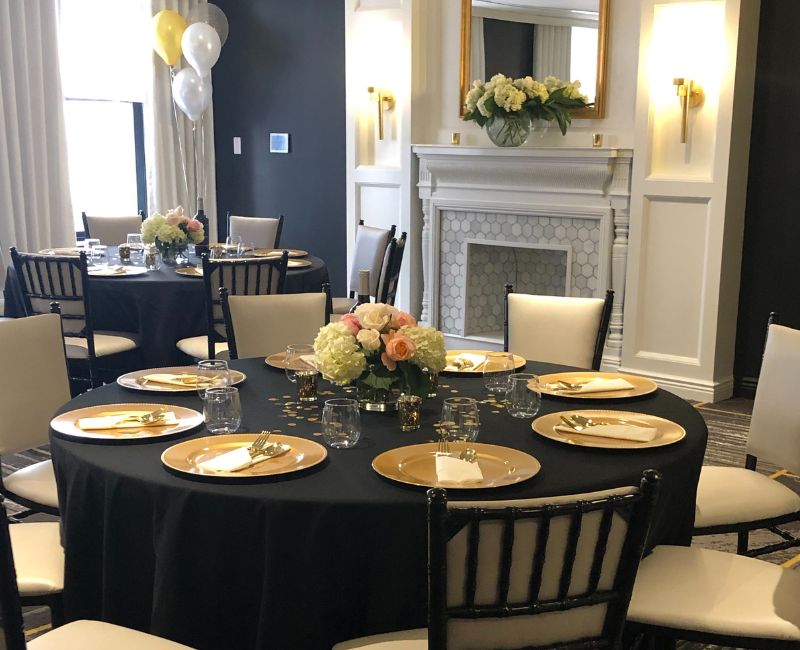 Event table with plates and chairs