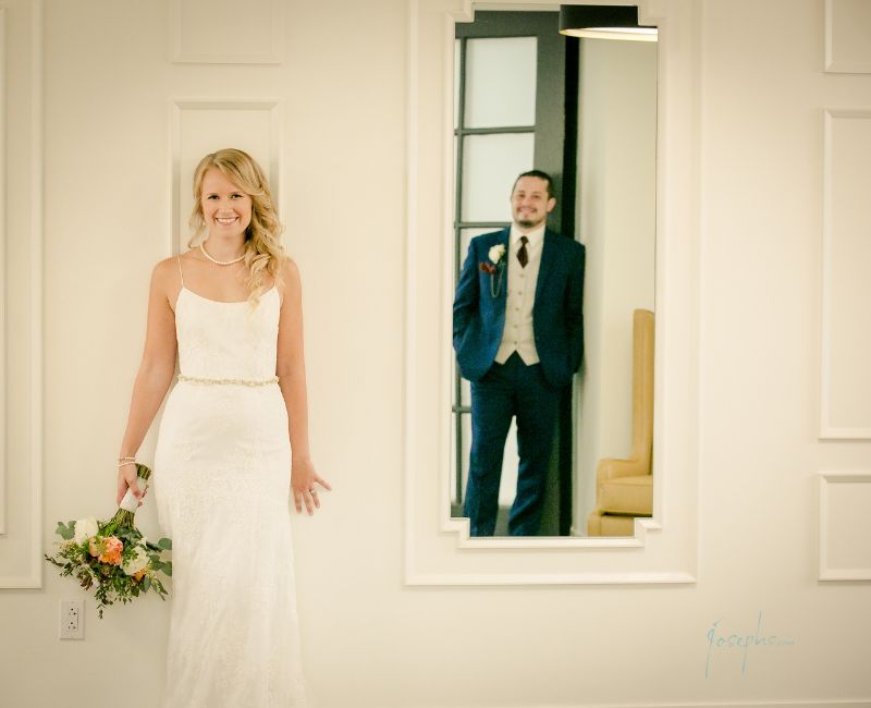 Bride and groom waiting to see each other at the Goodwin