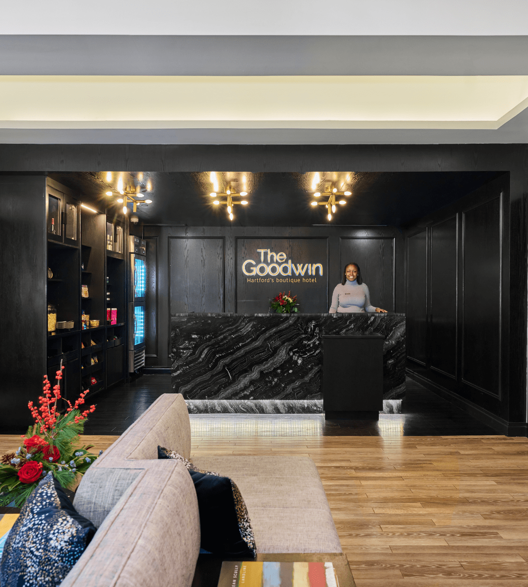 Lobby reception desk and worker at the Goodwin